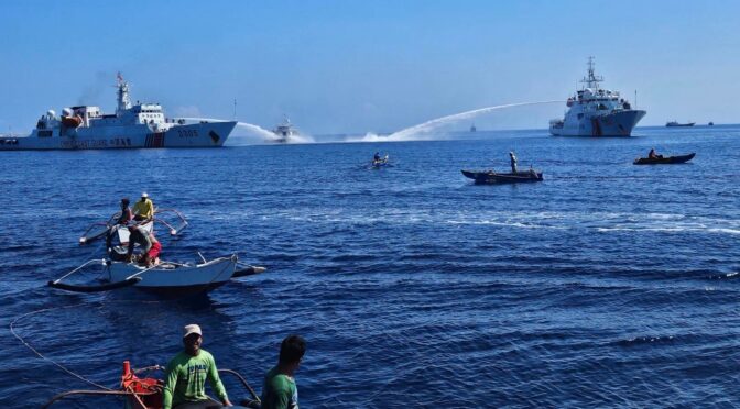 China Coast Guard vessels shoot water canons at fishermen in Bajo de Masinloc over the weekend. Source: Philippine Coast Guard, Public Domain